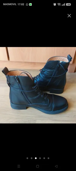 Botín piel negro acordonado con cremallera