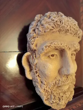 Escultura de cabeza de hombre años 60