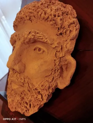 Escultura de cabeza de hombre años 60