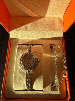 Reloj y pulsera de plata con pedrería