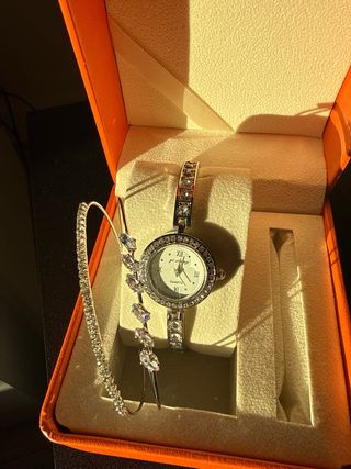 Reloj y pulsera de plata con pedrería