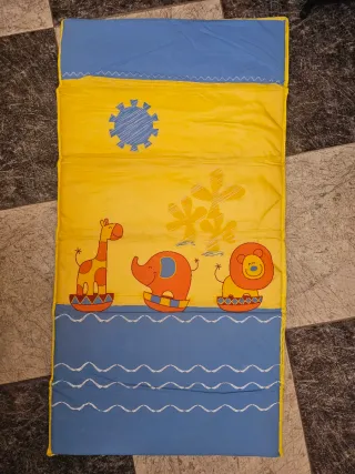 Cuna de viaje con ruedas