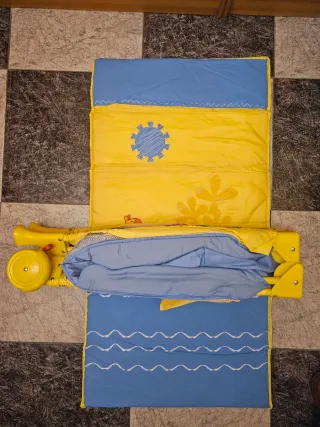 Cuna de viaje con ruedas