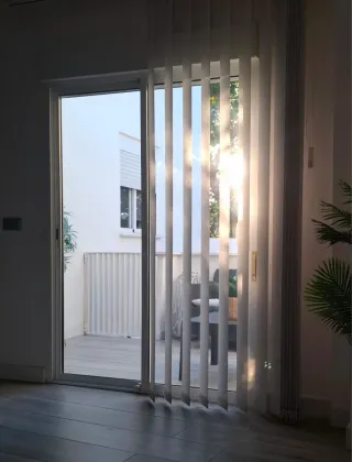 Ventanal con persiana