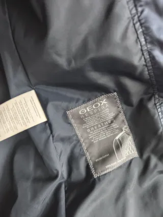 Plumas azul con capucha