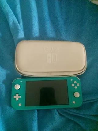 Nintendo Switch Lite Turquesa con muchos juegos