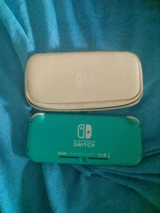 Nintendo Switch Lite Turquesa con muchos juegos