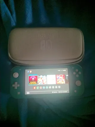 Nintendo Switch Lite Turquesa con muchos juegos