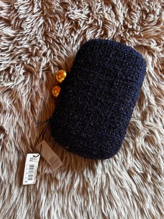 Bolso de mano clutch Parfois azul y dorado