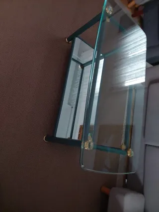 Mesa de centro cristal y metal dorado