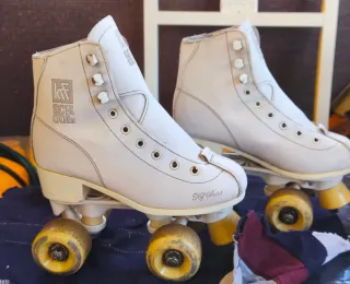 Pattini bianchi taglia 34