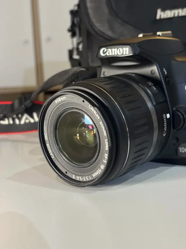 IMPECABLE Canon EOS 1000D