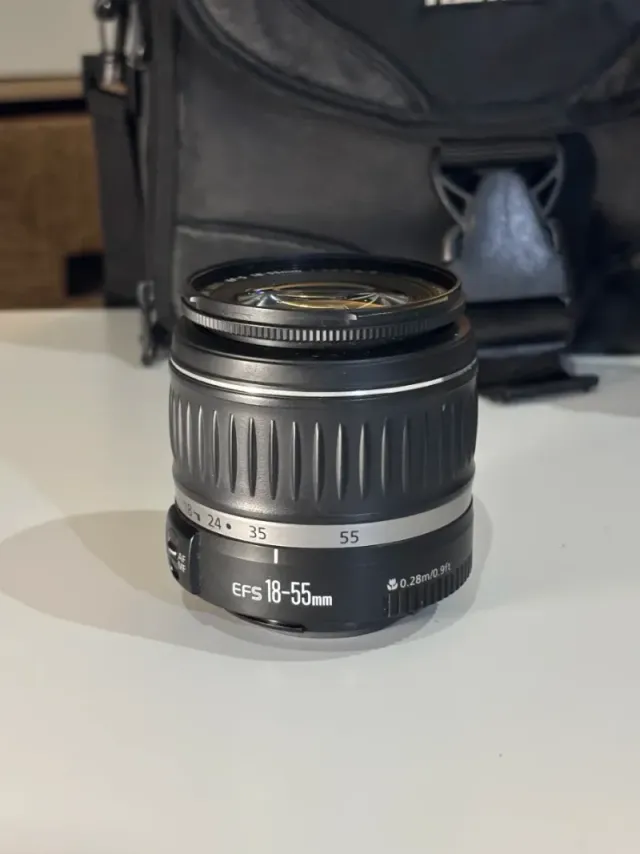 IMPECABLE Canon EOS 1000D