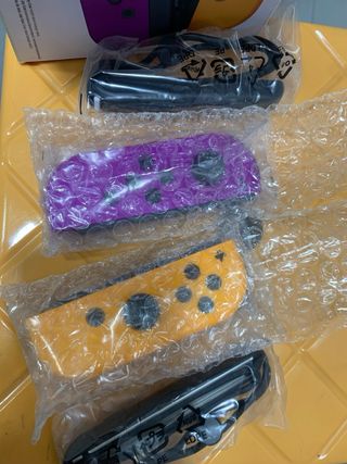 Mandos Nintendo Switch Morado y Naranja