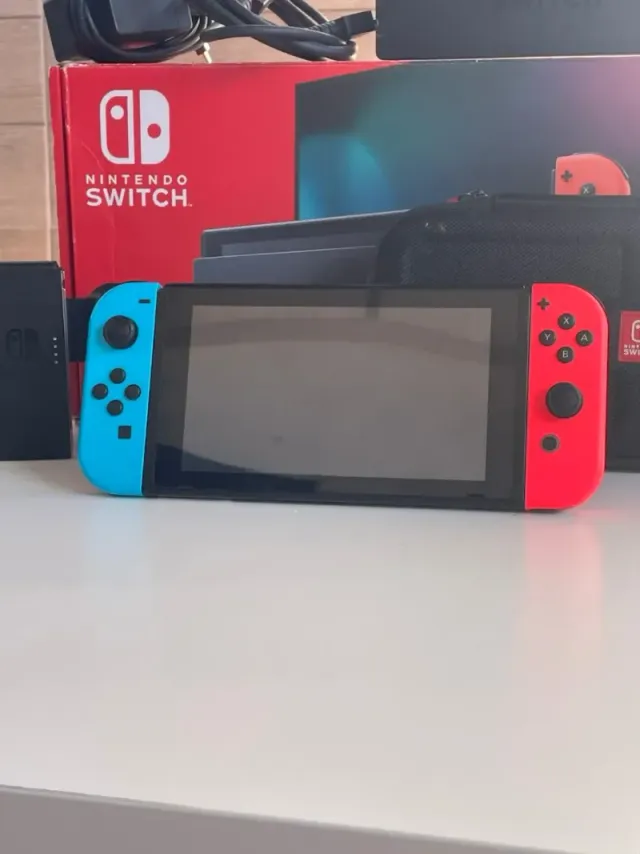 IMPECABLE Nintendo switch v2 con accesorios