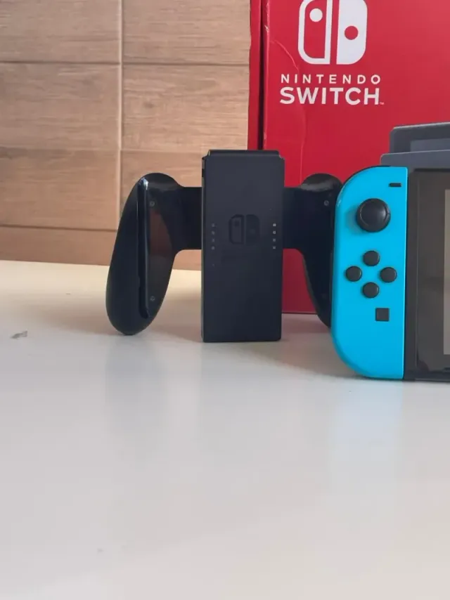 IMPECABLE Nintendo switch v2 con accesorios