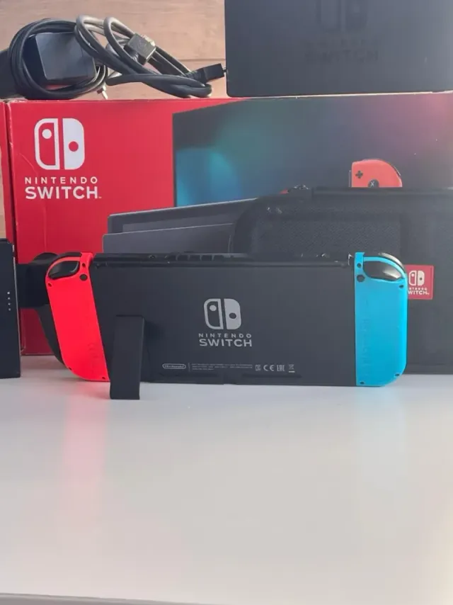 IMPECABLE Nintendo switch v2 con accesorios