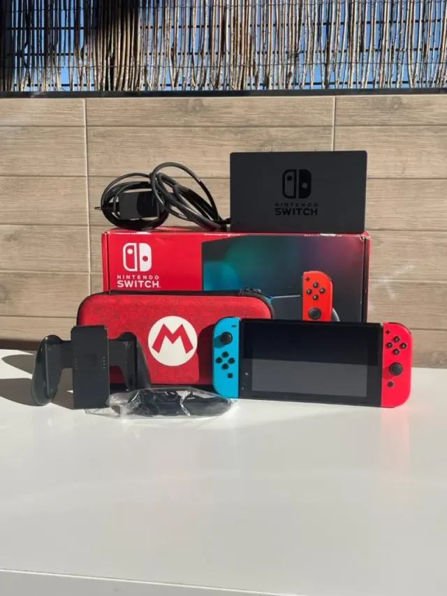 COMO NUEVA Nintendo Switch con accesorios