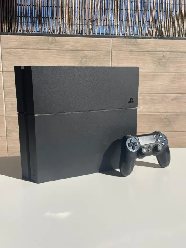 COMO NUEVA Ps4 Fat con mando