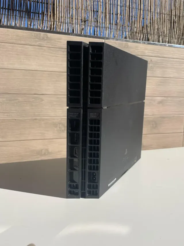 COMO NUEVA Ps4 Fat con mando