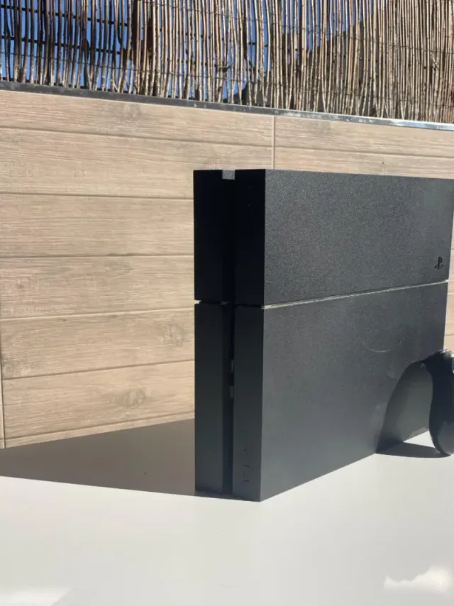 COMO NUEVA Ps4 Fat con mando