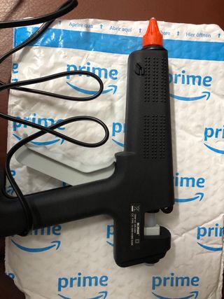 Pistola de silicona Ironside y barras adhesivas