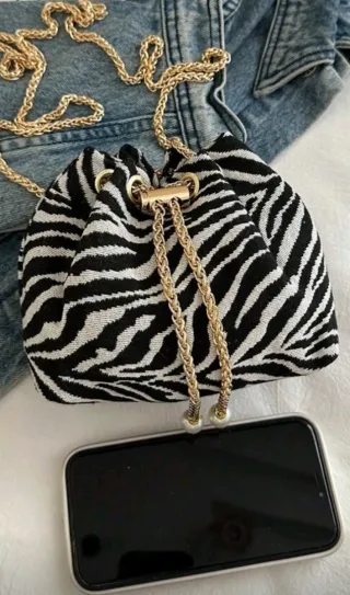 Bolso de fiesta cebra dorado