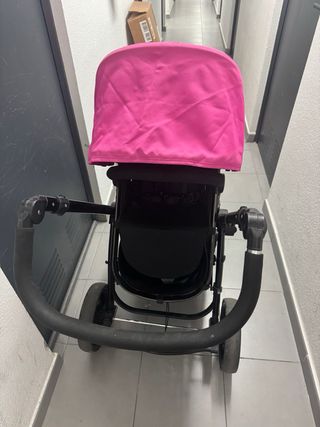 Carro de bebé negro y rosa