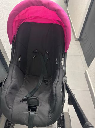 Carro de bebé negro y rosa