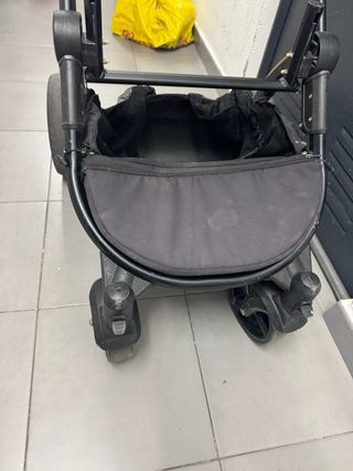 Carro de bebé negro y rosa