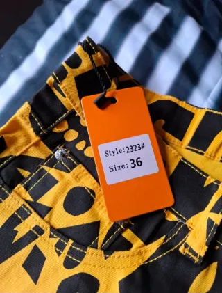 Pantaloni jeans stampa astratta giallo/nera