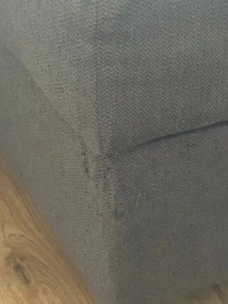 Sofá cama gris con almacenaje