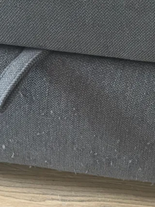 Sofá cama gris con almacenaje