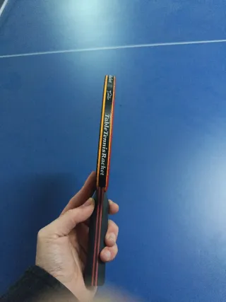 Raqueta de ping pong negra