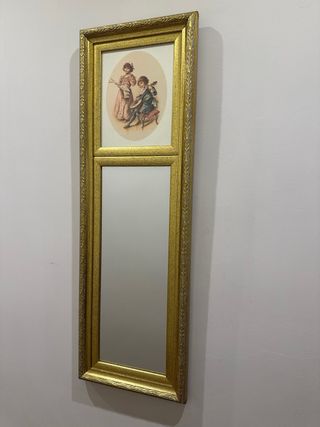 Espejo decorativo dorado con imagen