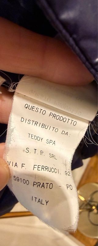 Plumífero azul de pluma de oca