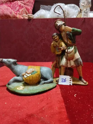 Figura belén burro y un ciego con niño