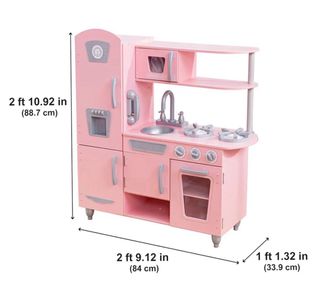 Cocinita de madera rosa vintage