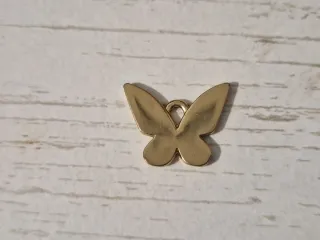 Colgante mariposa chapado en oro