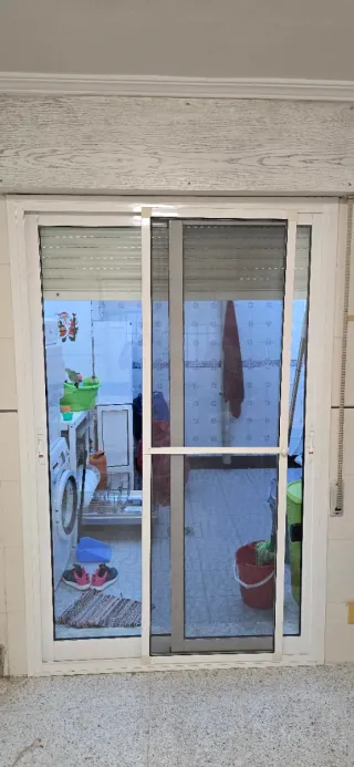 Puerta Aluminio Climalit y Mosquitera