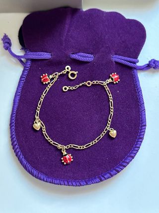 Pulsera mariquitas y corazones Baño oro 18k