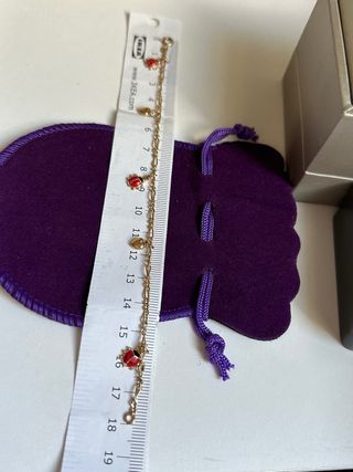 Pulsera mariquitas y corazones Baño oro 18k