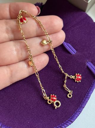 Pulsera mariquitas y corazones Baño oro 18k