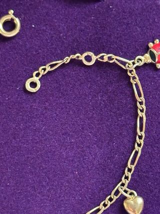 Pulsera mariquitas y corazones Baño oro 18k