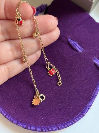 Pulsera mariquitas y corazones Baño oro 18k