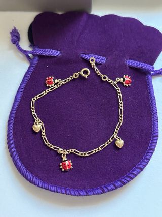 Pulsera mariquitas y corazones Baño oro 18k
