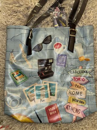 Bolso Dogo estampado mapa viajes
