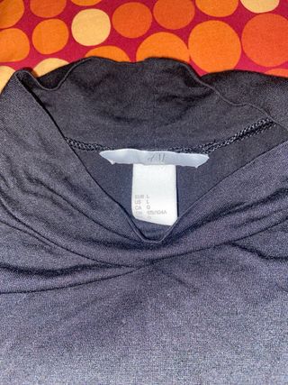 Body sin mangas cuello alto azul