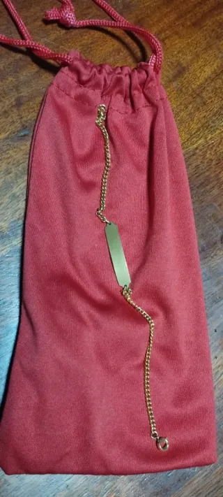 Pulsera de bisutería dorada