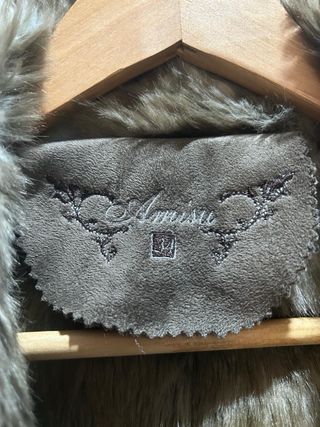 Chaleco de pelo beige y marrón